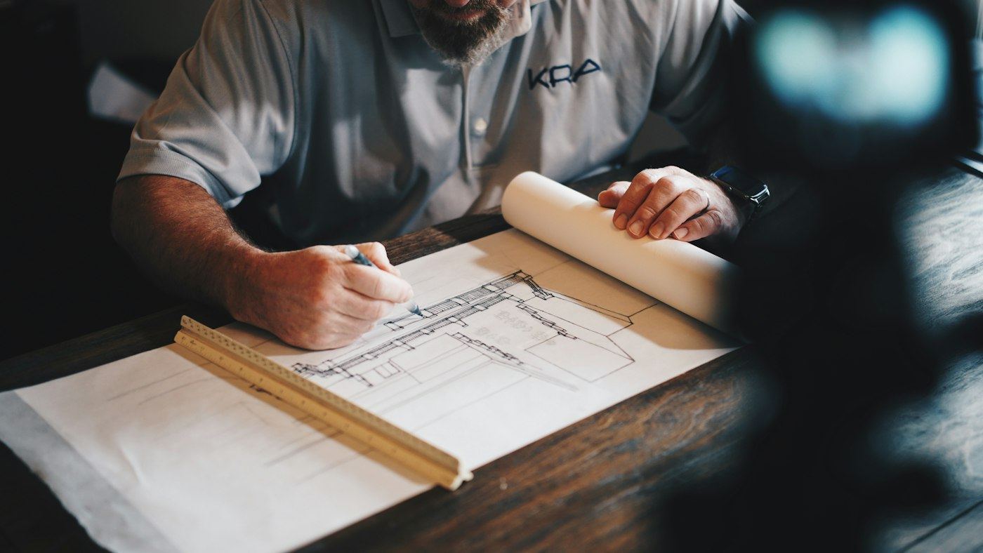Builder reviewing plans